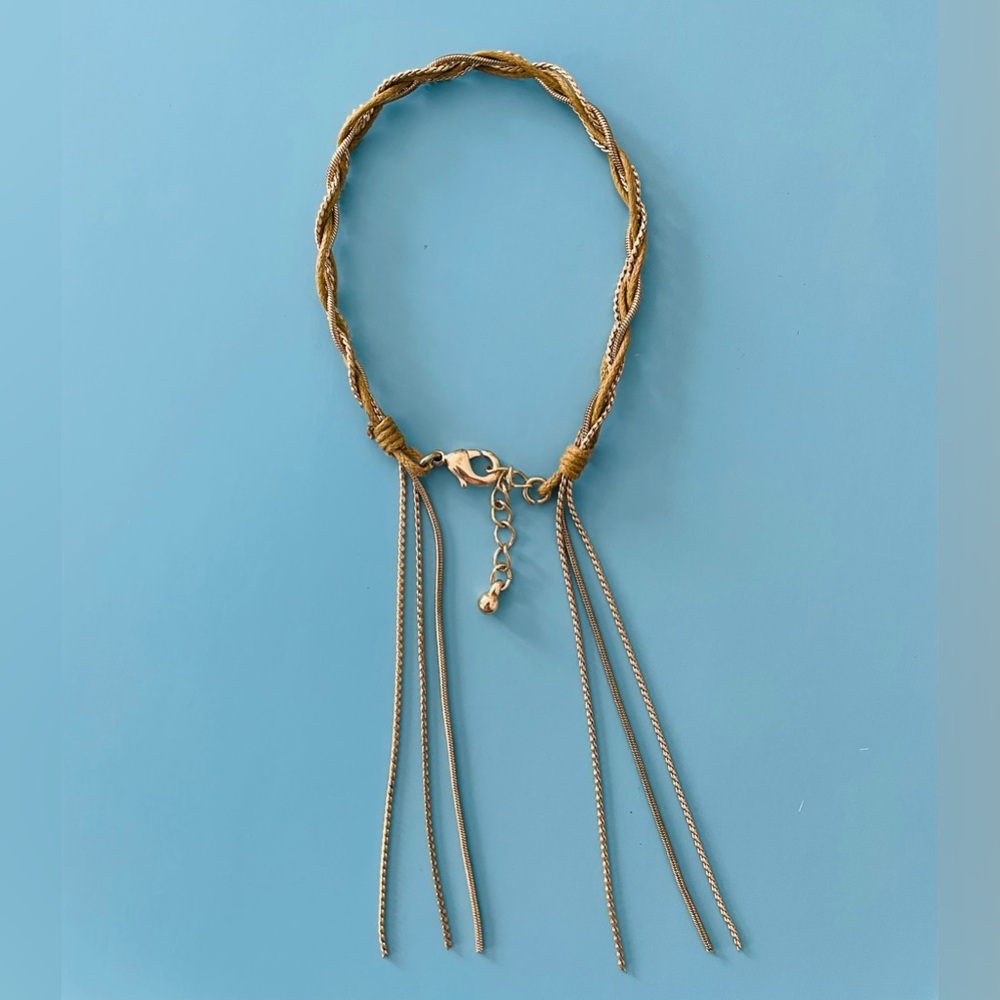Elegant Gold Braided Bracelet